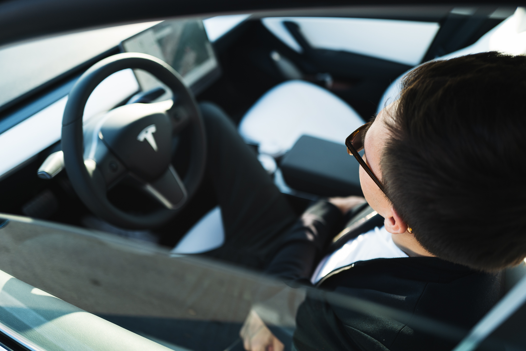 Driving waiting in the Tesla.