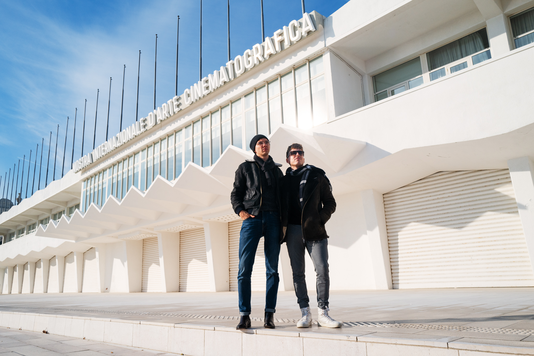 Jip and Lorenz standing in front of the Palazzo del Cinema on Venice Lido.